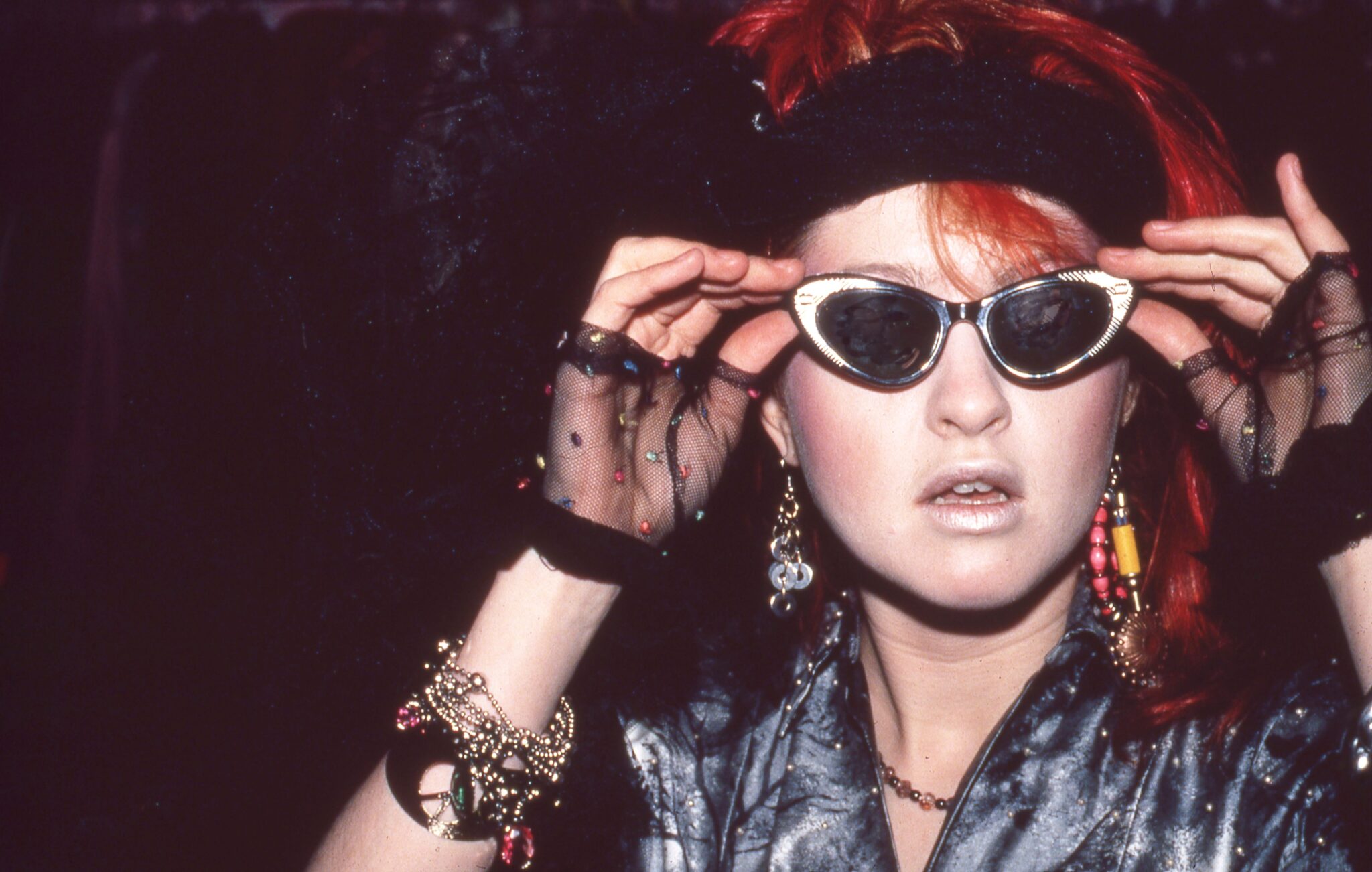 Cyndi Lauper at Screaming Mimi's Vintage Clothing Store in NYC 1984 © Laurie Paladino