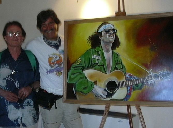 Country Joe McDonald ed Ezio Guaitamacchi con il quadro di Carlo Montana (Folkest 2007)